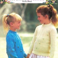 Patons 7082 - Saddle shoulder cardigan and sweater