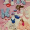 American school of needlework 1049 - booties - back cover