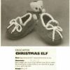 American school of needlework 1049 - booties - christmas elf